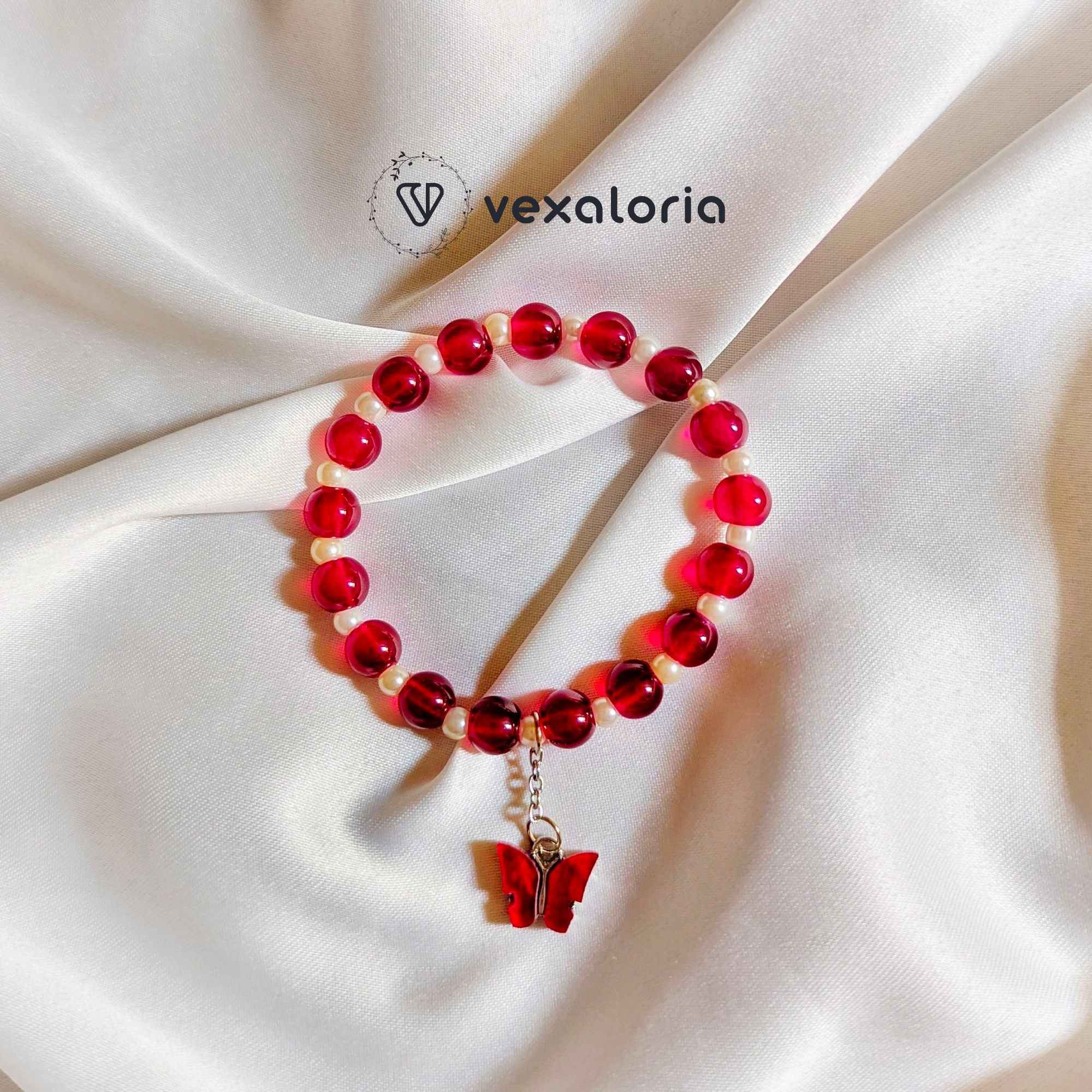 🦋 Elegant Maroon Pearl Butterfly Bracelet – Stretch Fit with Charm Bead